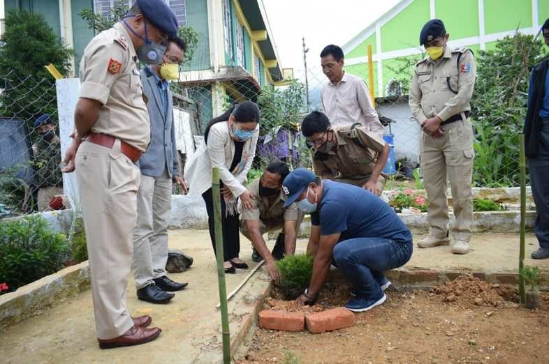 Deputy Commissioner of Wokha, OrenthungLotha planting trees on the occasion of World Environment Day on June 5. (DIPR Photo)